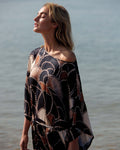 Robe midi en tissu soyeux